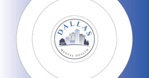 Dallas Mental Health logo: a circular seal with a Dallas skyline and trees, blue text reading DALLAS at the top and MENTAL HEALTH along the bottom, surrounded by concentric rings.